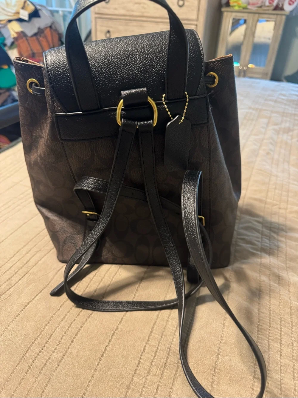 Coach Brown Signature Drawstring Backpack with Black Trim and Gold Hardware